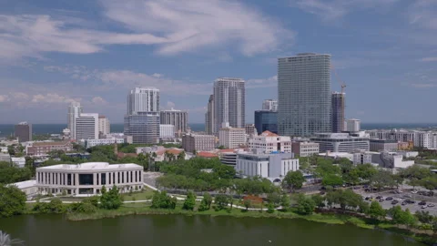 Cinematic aerial drone footage pulling back from downtown St Pete and Mirror Lak Stock Footage 334726685