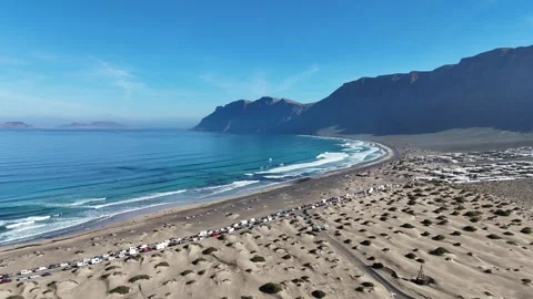 Cinematic aerial drone view of waves crashing on the coastline in Lanzarote Stock Footage 327652104