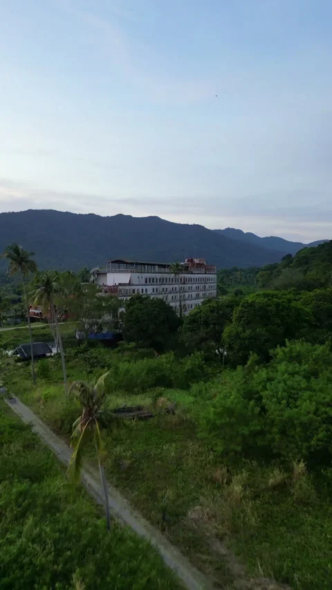 Cinematic Aerial of Ghost Ship Koh Chang Abandoned Cruise Ship Thailand Stock Footage 338390657