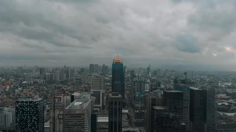 Cinematic aerial shot of a building on a city Stock Footage