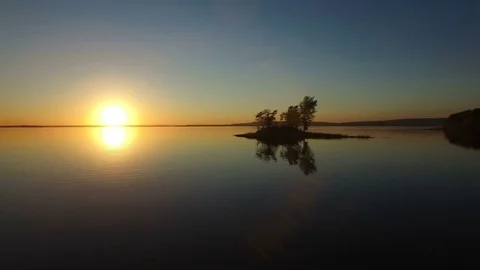 Cinematic Aerial Shot of Small Island During Sunset Stock Footage