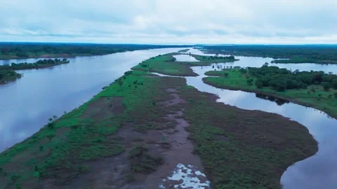 Cinematic Aerial Sunset View, Winding River Through Tropical Landscape Stock Footage 342293290