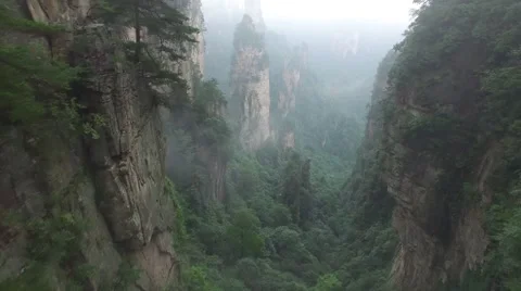CINEMATIC AERIAL TILT FLY BY OF ZHANGJIAJIE AVATAR MOUNTAINS IN HUNAN CHINA Stock Footage