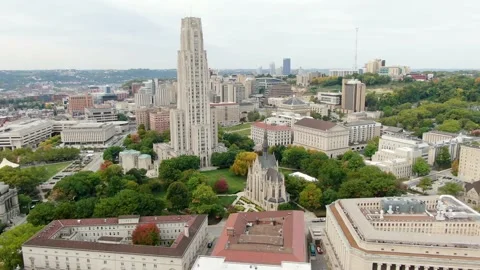 Cinematic aerial truck shot of Pitt University and Carnegie Mellon college Stock Footage