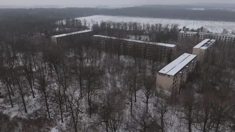 Cinematic Aerial View of an Abandoned Soviet Barracks Complex in Winter, Germany Stock Footage 328732489