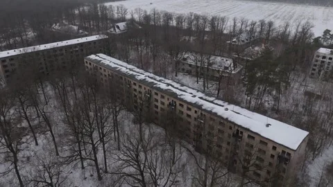Cinematic Aerial View of an Abandoned Soviet Barracks Complex in Winter, Germany Stock Footage 328732631