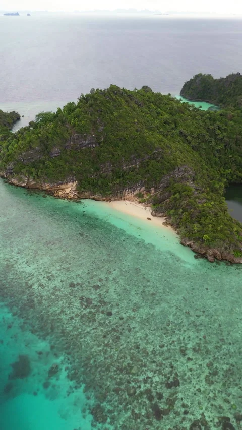 Cinematic Aerial View of Deserted Small Island Misool Raja Ampat Stock-Footage 336974932