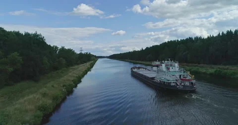 Cinematic aerial view empty cargo ship on Moscow canal Stock Footage 157834661