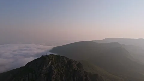 Cinematic Aerial View Of Monte Penna Peak Above Cloud Inversion At Sunrise Stock Footage 339100053