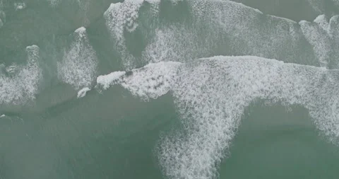 Cinematic Aerial View Of Waves Breaking Dramatically On Cape Town Beach Stock Footage