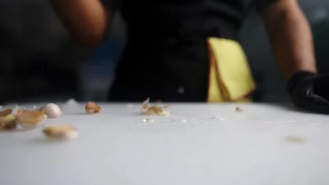 Cinematic and creative view of a chef crushing a garlic bulb Stock Footage 304688897