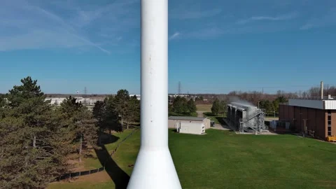 Cinematic Arial View Ascending from the bottom of a Water Tower Stock Footage 307601284