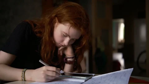 Cinematic back to school scene showing a student studying mathematics Stock Footage 341736035