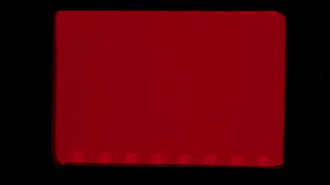 Cinematic background screen loop footage of old negative film strip frame Video stock 310538373