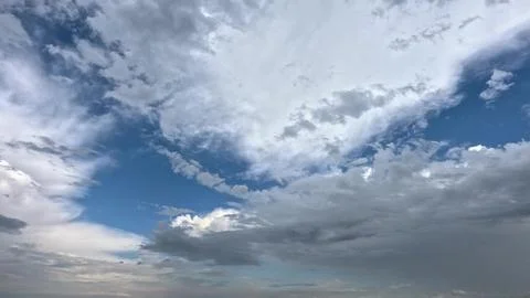 Cinematic beautiful celestial floating clouds across sky. Beautiful sky, white Fotos de archivo