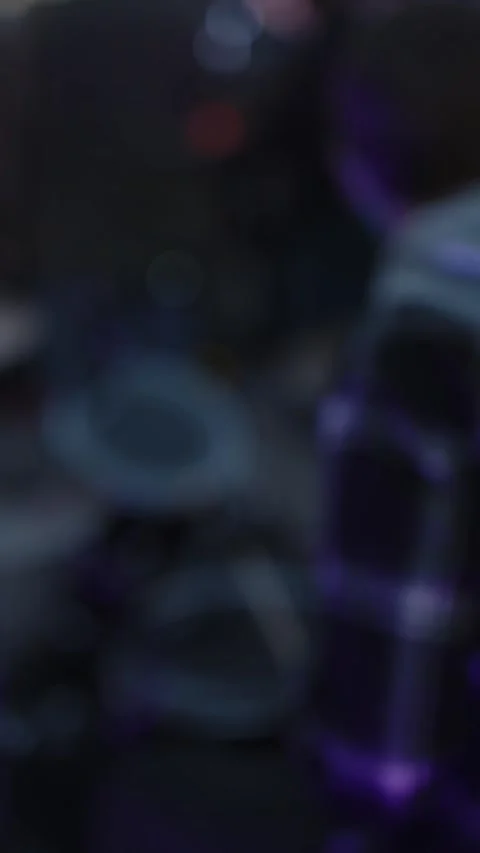 Cinematic blurry shot of a drum kit with purple bokeh lights Stock Footage 335075351