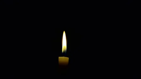 Cinematic candle Flame in the Wind Stock Footage 165072704