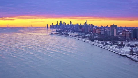 Cinematic cityscape pan along Lake Michigan shoreline Stock Footage 331051953