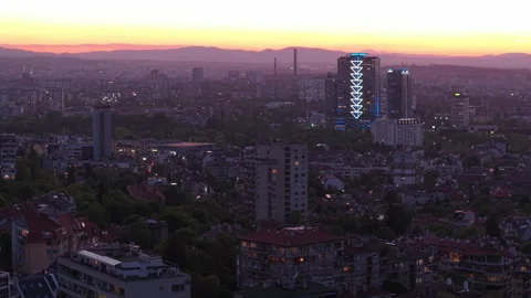 Cinematic Cityscape of Sofia Bulgaria at Sunset with Urban Skyline and Golden Stock Footage 308930146