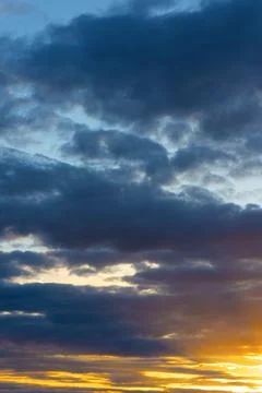 Cinematic cityscape at sunset with dramatic clouds Stock Photos