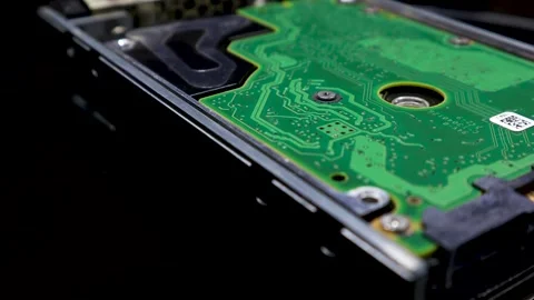 A cinematic clip of server hard disk drive rotating on a an automatic stand Stock Footage 263043217