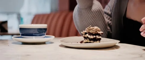 Cinematic close-up of chocolate cake being eaten in a cafe Stock Footage 323935762