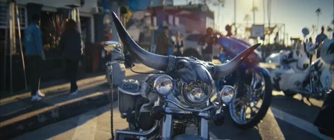 Cinematic Close-Up of Custom Horned Motorcycle on Venice Beach Boardwalk at Gold Stock Footage 323155209