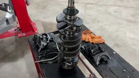 Cinematic Close Up, Engine Crankshaft During Automotive Rebuild Process Stock Footage 342222200