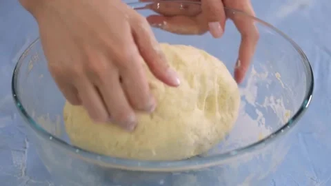Cinematic close up kneading dough on table by professional artisan baker ba.. Stock Footage 272466816