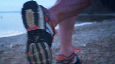 Cinematic close up of a man running - and wide angle drone shot Stock Footage 49075554