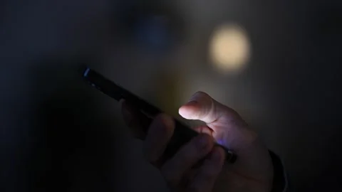 Cinematic Close Up Of Man Using Mobile Phone At Night 스톡 동영상 274839089