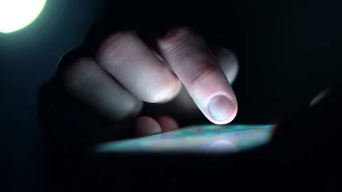 Cinematic Close Up Of Man Using Social Media On Mobile Phone At Night Stock Footage 136683083