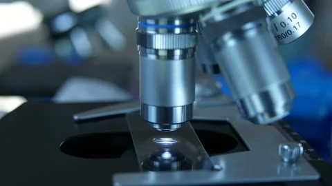 Cinematic Close Up Of Scientist Preparing A Microscope For Research Stock Footage 168424177