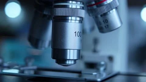 Cinematic Close Up Of Scientist Preparing A Microscope For Research Stock Footage 190986832
