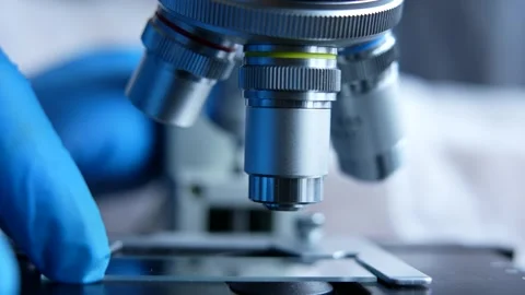 Cinematic Close Up Of Scientist Preparing A Microscope For Research Stock Footage 190988832
