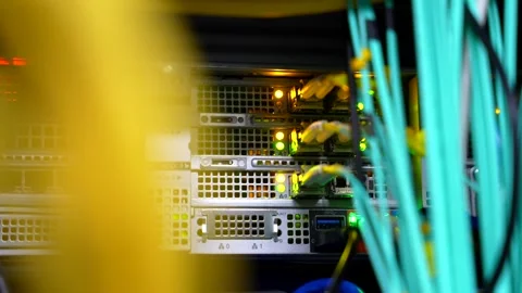 Cinematic Close Up of Server with Blinking Lights and Connected Network Cable Stock Footage 341696286