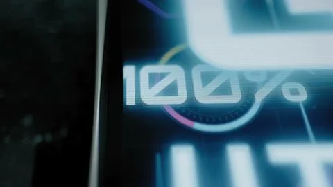 Cinematic close view shows the GPU utilization meter reaching an exact 100 Stock Photos