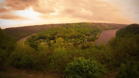 Cinematic clouds roll by over beautiful color graded valley Stock Footage 89856194