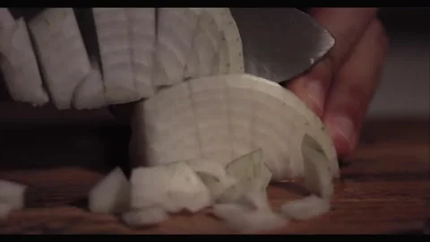 Cinematic Cooking Sequence – Rolling Onion, Knife Toss, and Precise Slicing Stock Footage 306574528