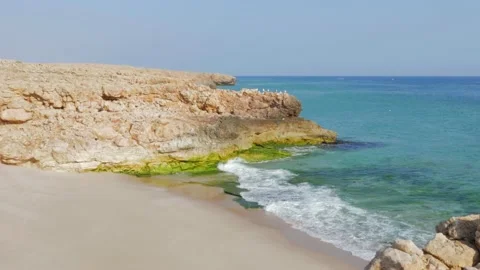 Cinematic crane shot of a empty beach in Oman Stock Footage 232501233
