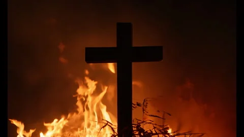 Cinematic Cross in Front of Flames at Night, Christian Cross Burning Fire in 4K Video stock 278683242