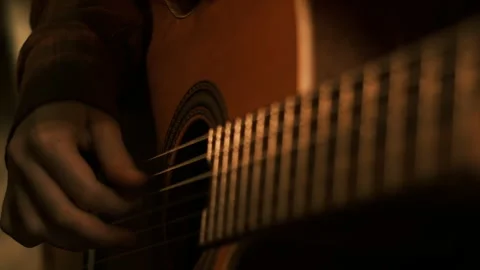 Cinematic dark key, hands playing classical guitar Stock Footage 258742552