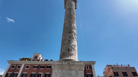 Cinematic daytime footage of the Column of Marcus Aurelius in Piazza Colonna Stock Footage 338009551