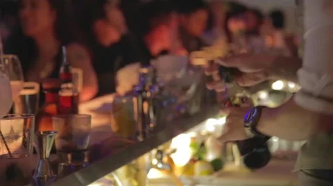 Cinematic dolly shot of bartender mixing a drink Stock Footage