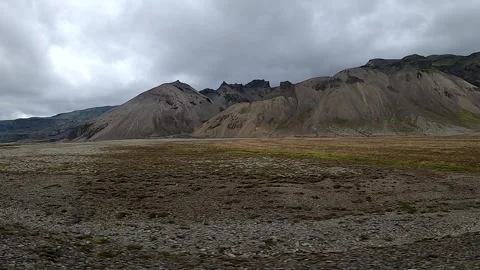 Cinematic drive-by shot of dramatic mountain ridges in Iceland Stock Footage 334136034