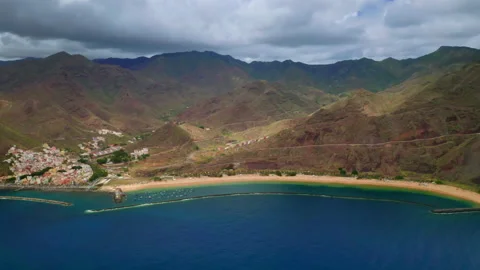 Cinematic Drone Aerial Pull Back Shot of Beach in San Andres Tenerife Canary Stock Footage 154332481