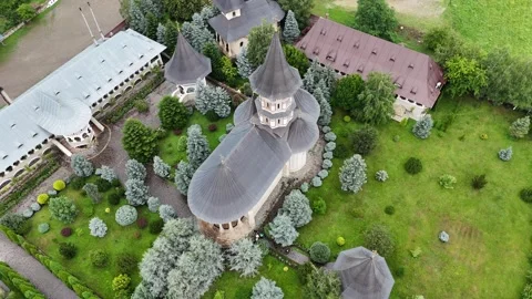 Cinematic Drone Approach to the Iconic White Church of Cămârzani Monastery Stock Footage 314231411