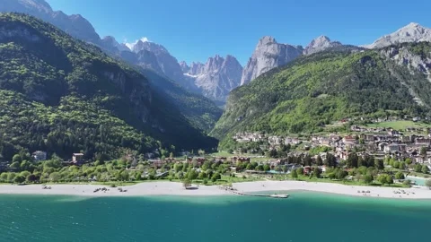 Cinematic Drone Approach Over Alpine Lake and Dolomite Mountain Landscap Vídeo Stock 337088553