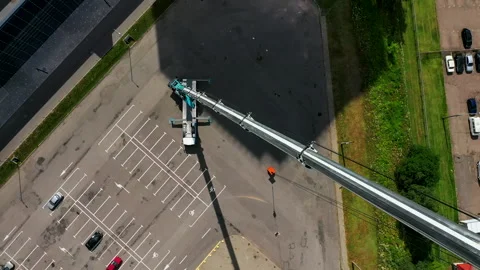 Cinematic drone flight along fully extended boom of a large mobile truck crane. Stock Footage 144625528