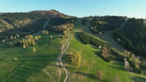 Cinematic drone flight along a mountain ridge trail on Prusow hill, overloo.. Stock Footage 335475081